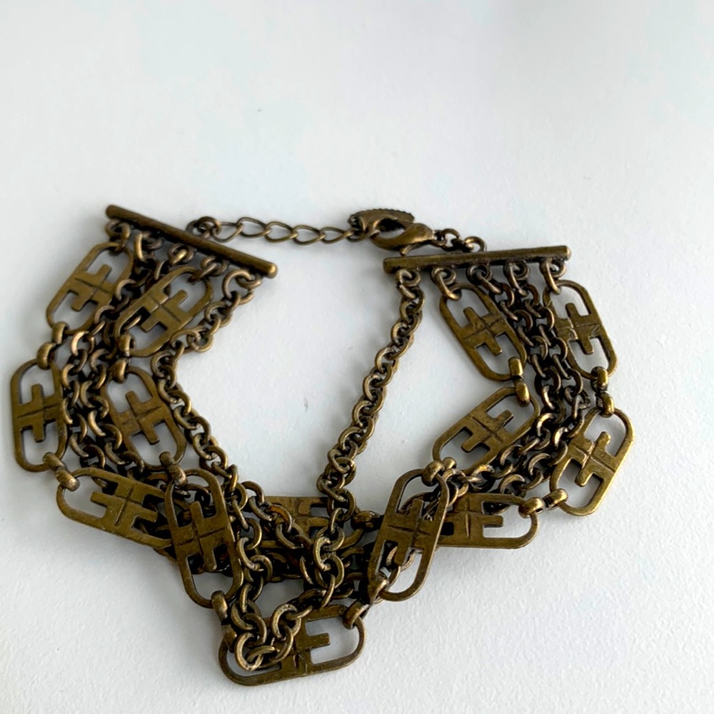 Vintage VCLM TM multi strand metal brass tone bracelet, signed